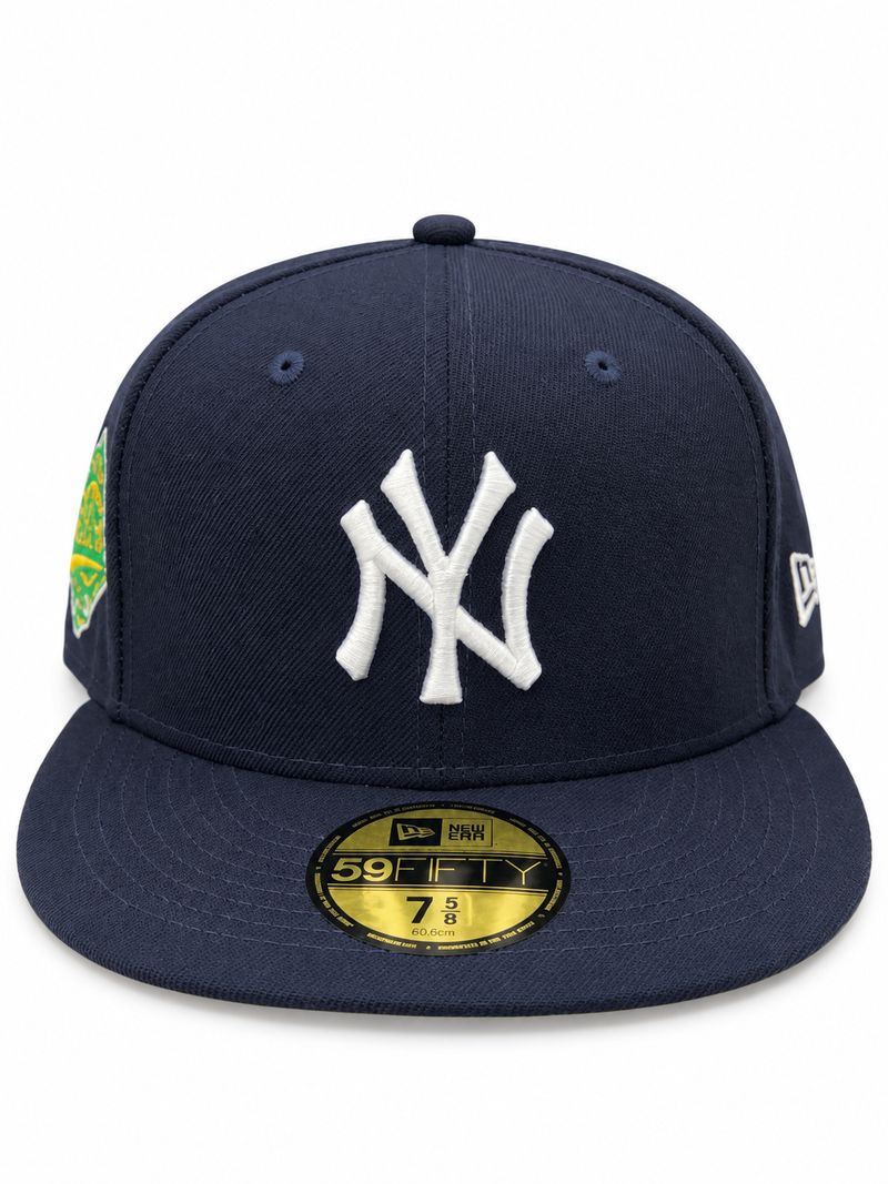 New Era New York Yankees World Series navy and yellow 59FIFTY fitted hat – front view with white NY logo and embroidered side patch