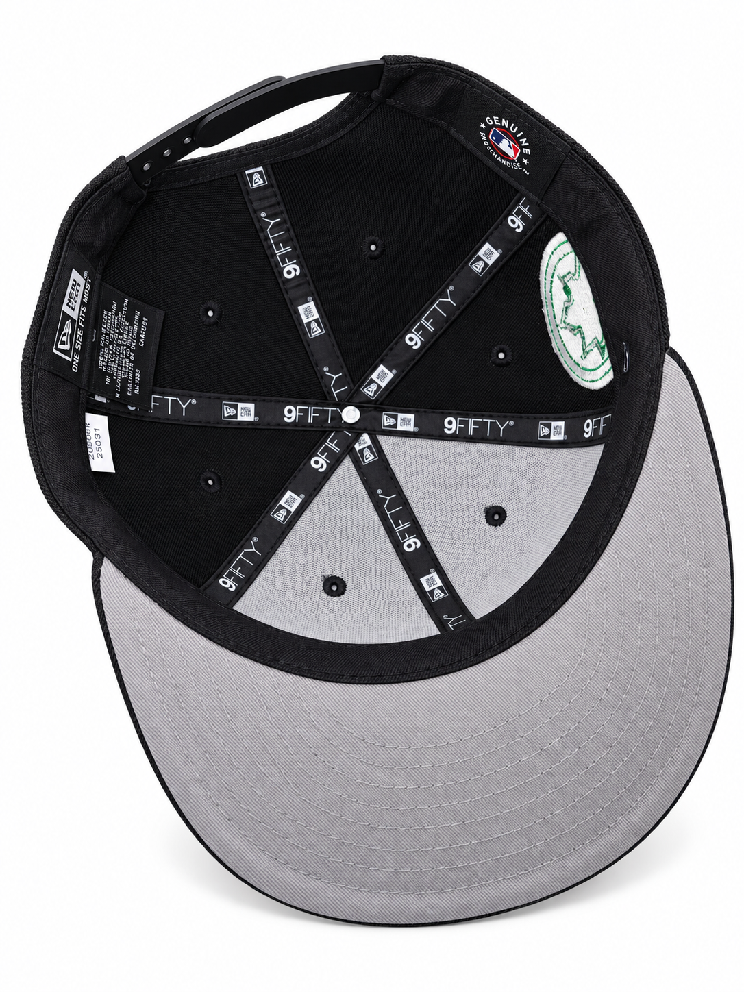 Black cap – underside view with grey undervisor and green inner patch