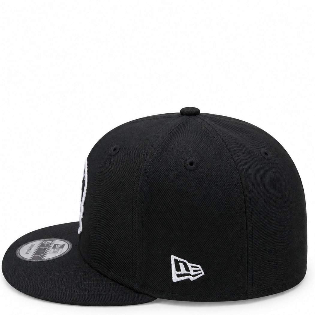New Era LA Dodgers Sugar Skull black 9FIFTY snapback hat – side view with white LA logo and white New Era flag
