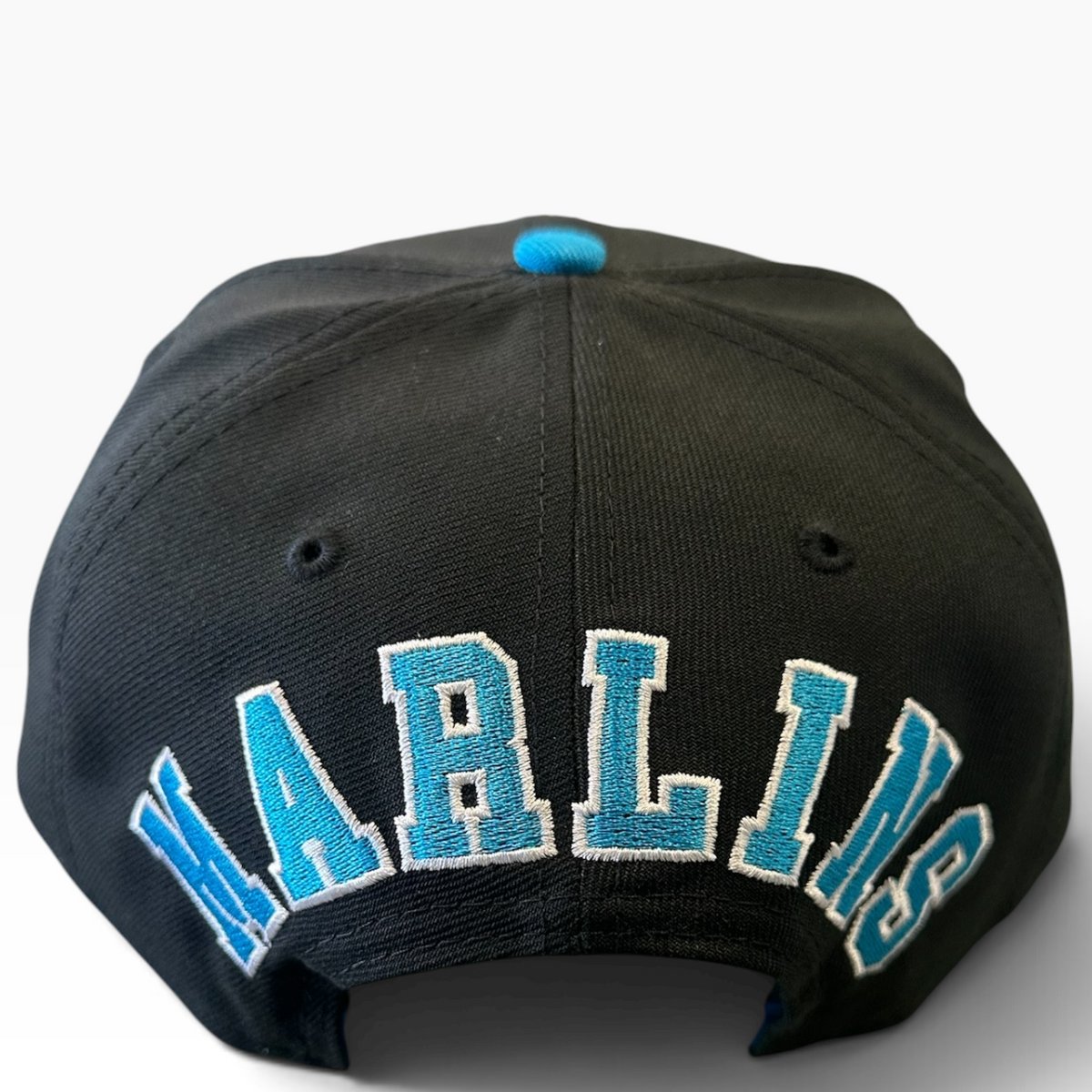 Marlins black snapback with aqua brim and back embroidery - back view