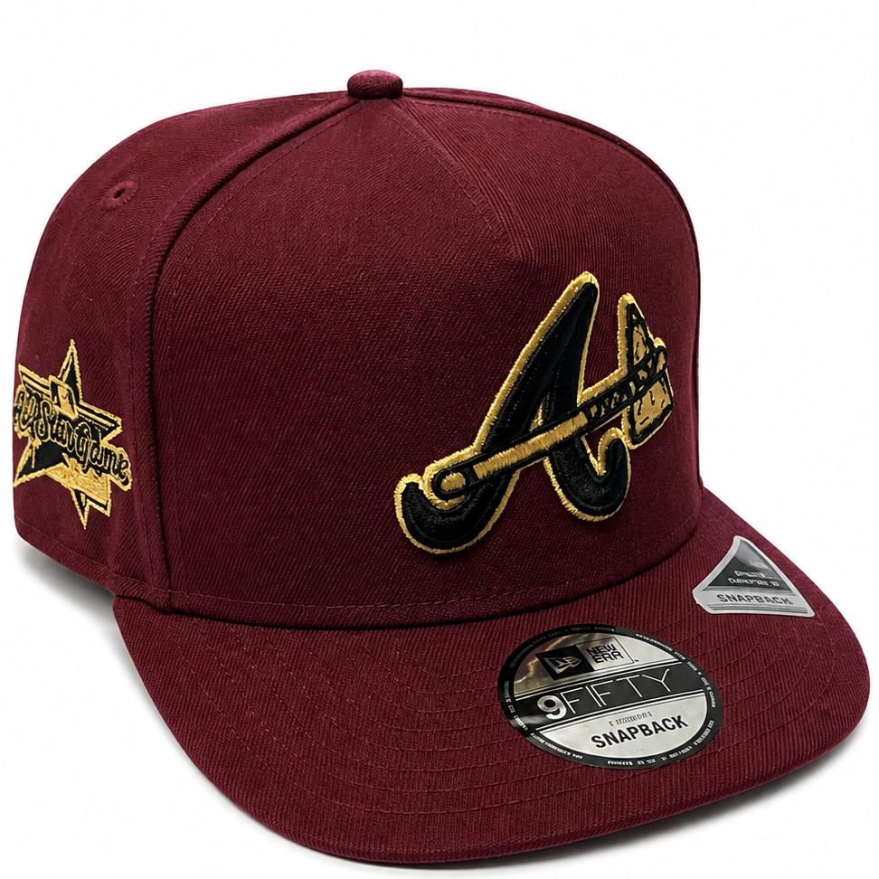 Atlanta Braves burgundy and gold New Era 9FIFTY snapback hat - front view