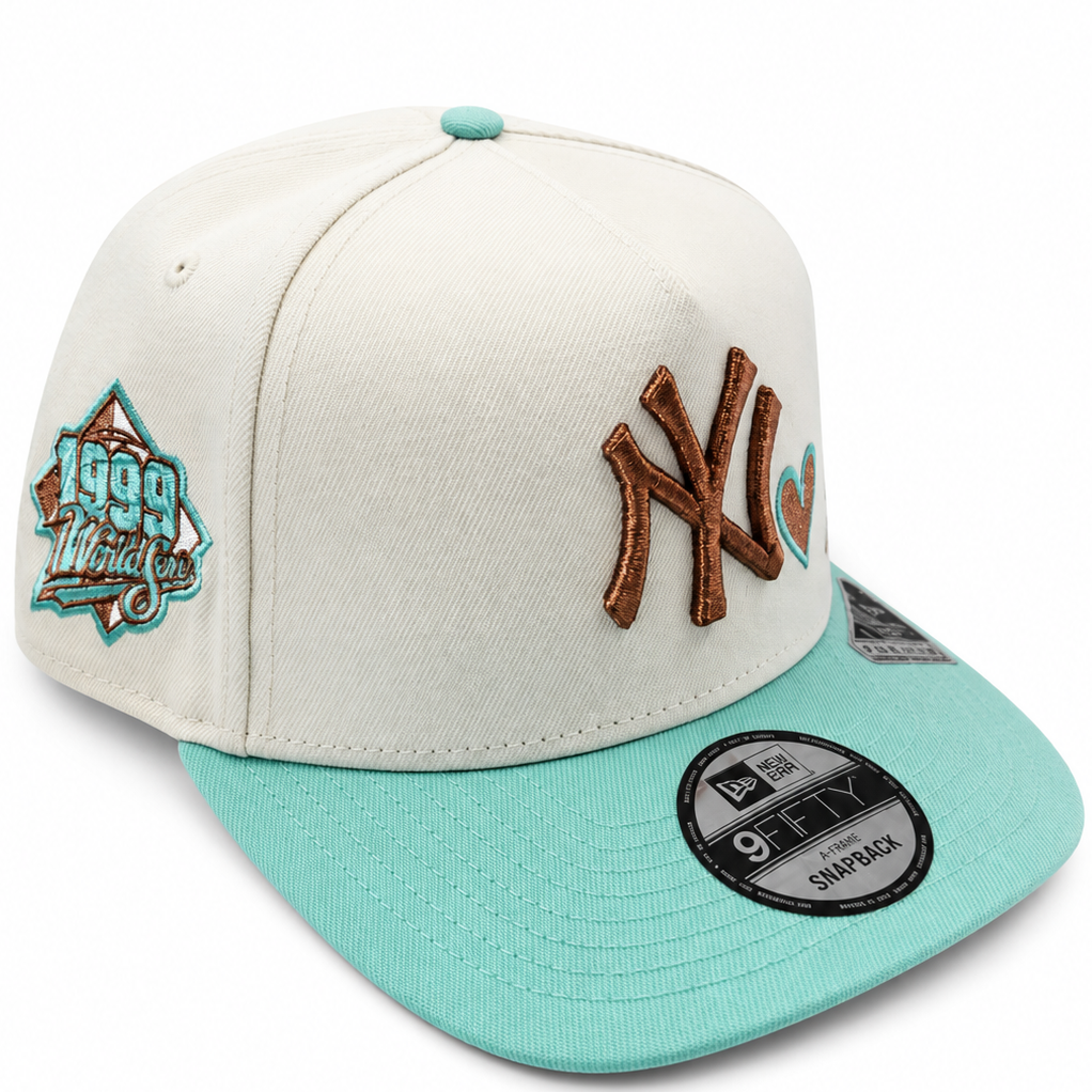 NY Heart cream and turquoise A-Frame snapback with 1999 World Series side patch - side view