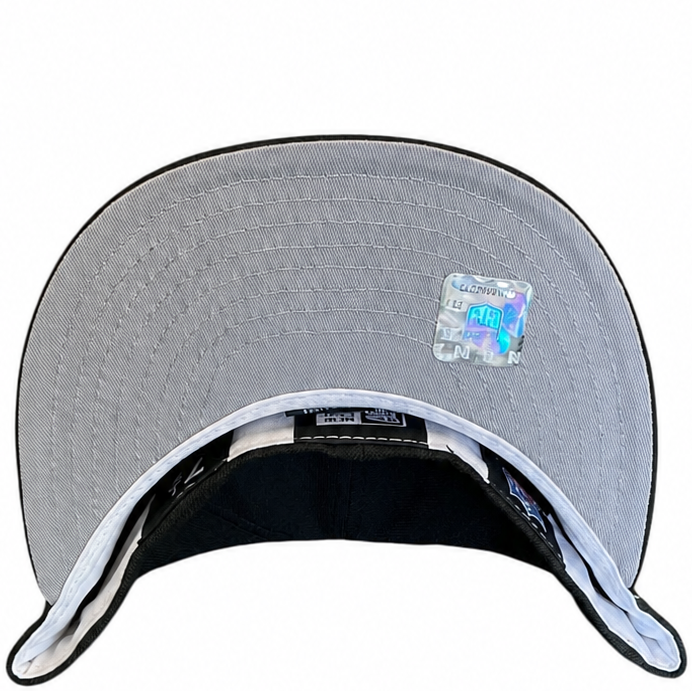 Las Vegas Raiders black New Era 59FIFTY fitted hat - side view