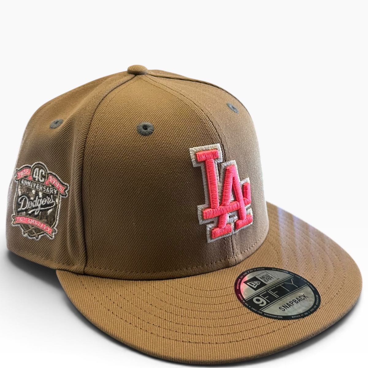 Dodgers brown snapback with pink LA logo and anniversary side patch - side view