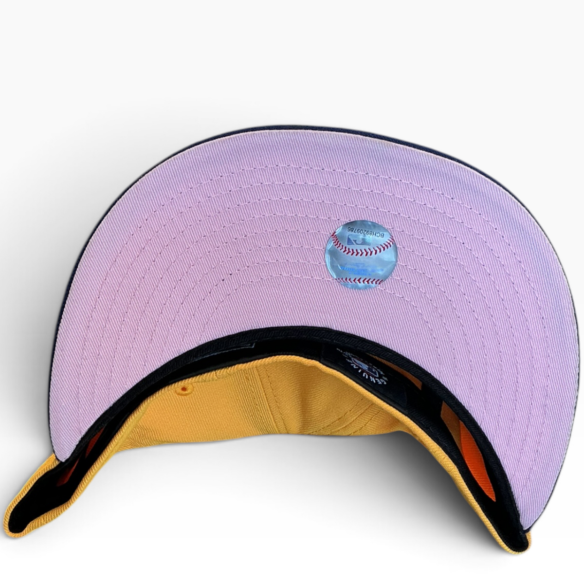 Colorado Rockies gold and navy 30th Anniversary New Era 59FIFTY fitted hat - undervisor detail
