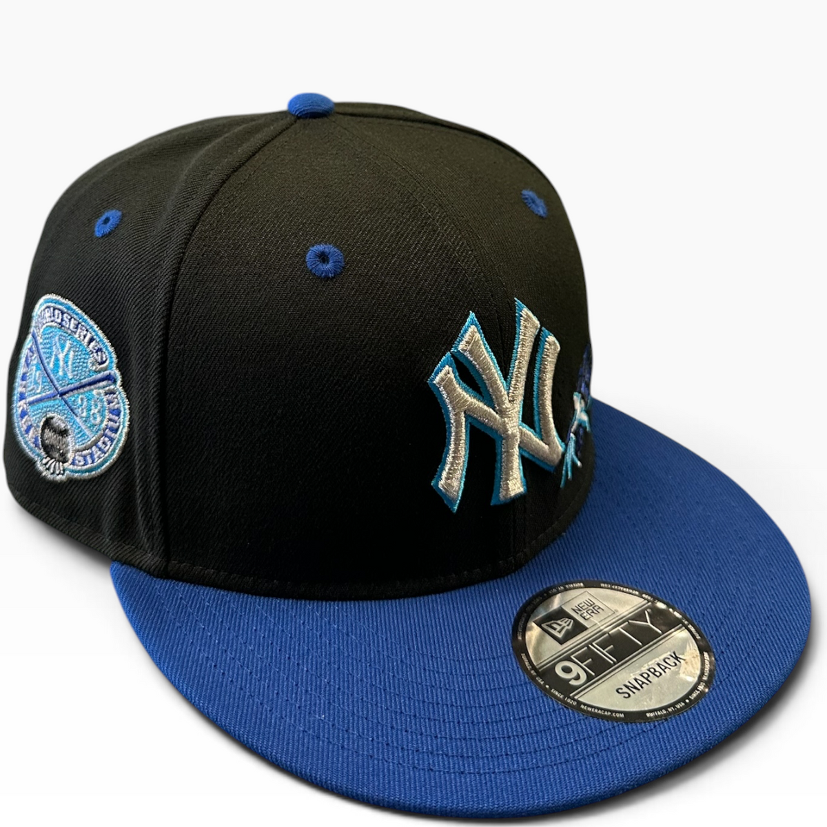 Yankees black snapback with royal blue brim and rose graphic - side view