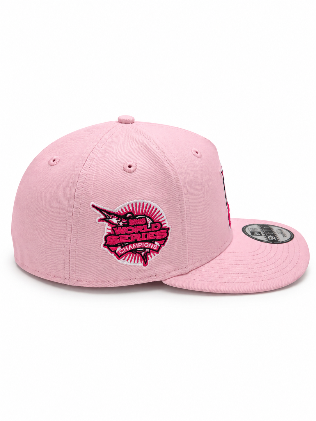 Pink Florida Marlins New Era 9FIFTY snapback hat – side view with magenta World Series Champions side patch