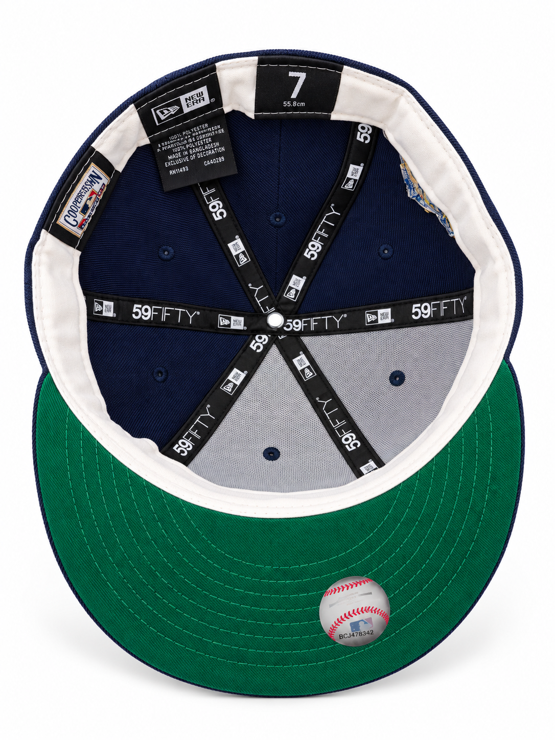 New York Yankees 1999 World Series New Era 59FIFTY fitted hat – underside view with green undervisor and navy crown lining