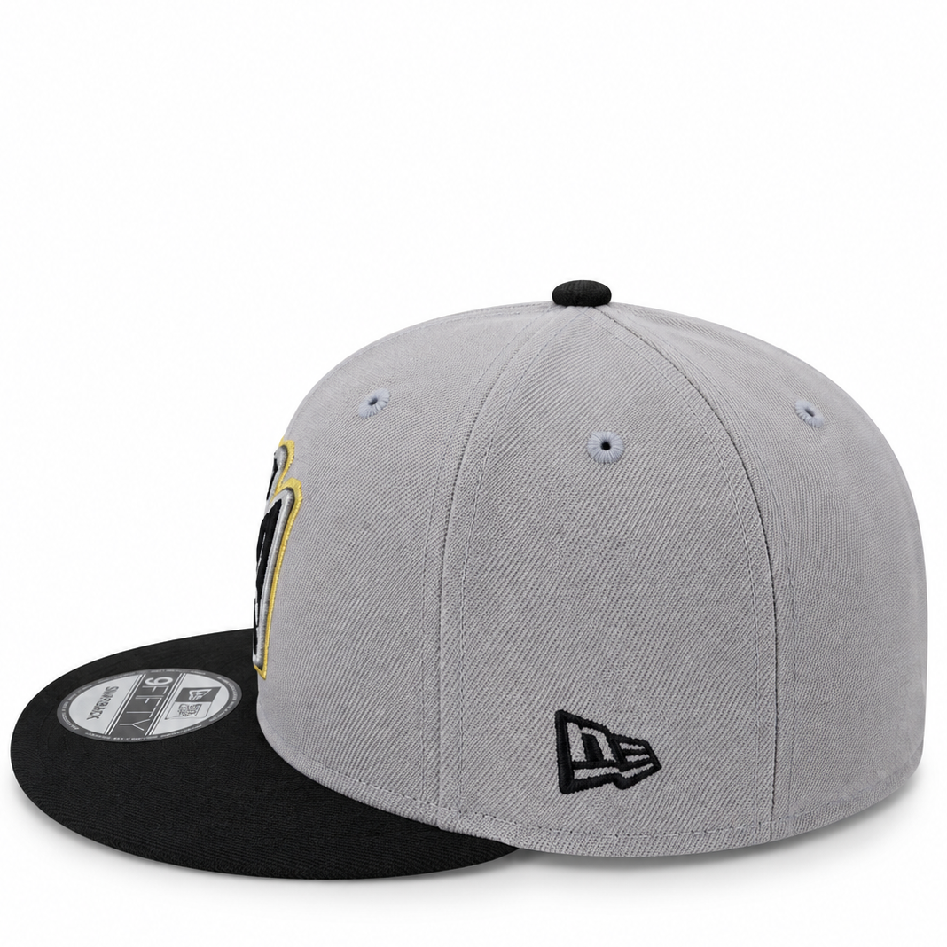 New Era Angels 50th Anniversary grey and black 9FIFTY snapback hat – side view with black flat brim and gold embroidered side patch