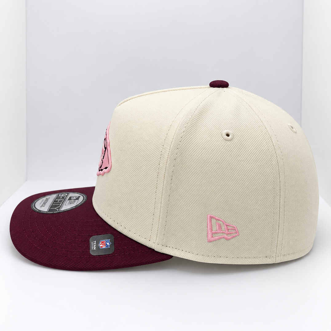 New Era Kansas City Chiefs Pink Hearts 9FORTY A-Frame hat – side view with maroon brim, pink heart embroidery and pink New Era flag