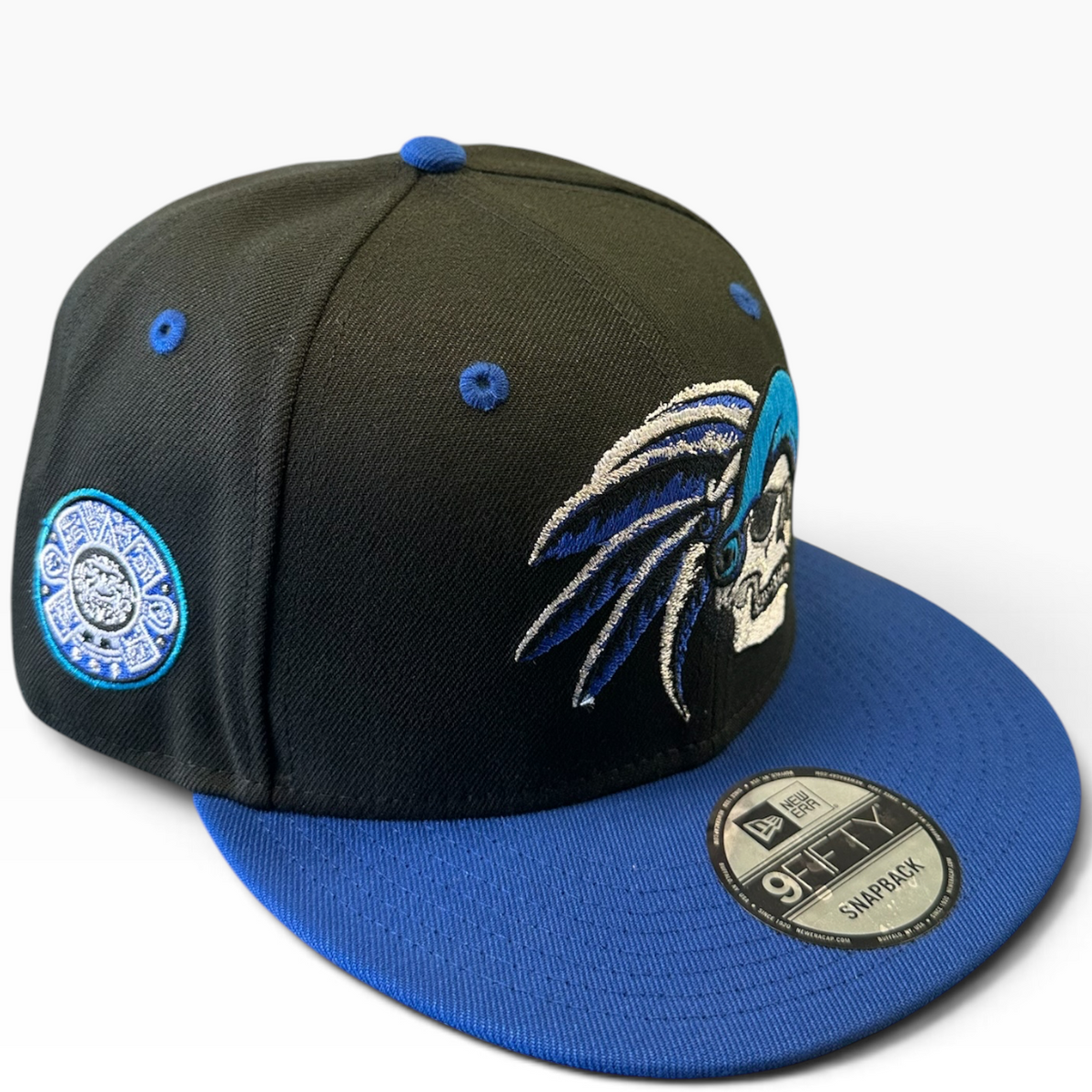 Skull graphic snapback with feathered headdress design - alternate view