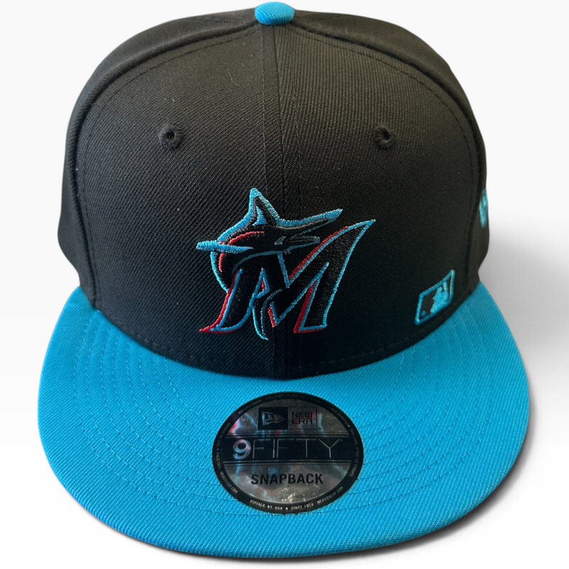 Miami Marlins black and aqua New Era 9FIFTY snapback hat - front view
