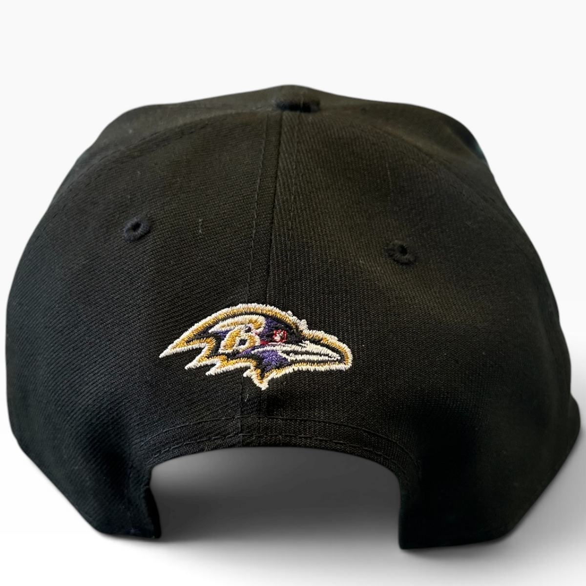 Baltimore Ravens Black Multi-Logo New Era 9FIFTY snapback hat - back view