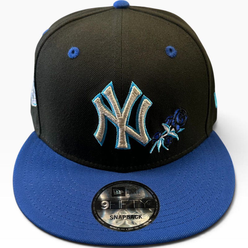 New York Yankees black and royal blue New Era 9FIFTY snapback hat - front view
